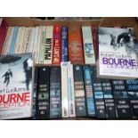 A quantity of paperback novels including; Agatha Christie, Robert Ludlum, Tom Clancy, etc.