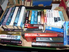 A box of novels to include; Jeffrey Archer, John Grisham, etc.