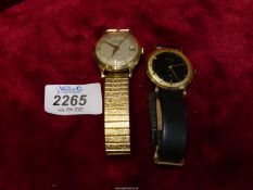 A vintage Majex gold wristwatch and a vintage Accurist gold wristwatch.