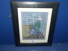 A framed and mounted charcoal drawing of a lady sitting on a bench by the sea reading a book,