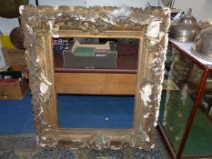 A large ornate picture frame, aperture size 65cm x 78cm approx.