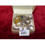 A bag of mixed rings some stamped 925 silver, one ring having silver thrupence insert,