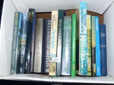 A box of books to include;Places to Visit in Britain, The Book of London, The Unexplained,