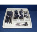 A quantity of Kings pattern cutlery including dinner knives, forks, dessert spoons, soup spoons etc.