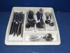 A quantity of Kings pattern cutlery including dinner knives, forks, dessert spoons, soup spoons etc.