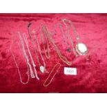 A quantity of costume jewellery including necklaces, chains etc.