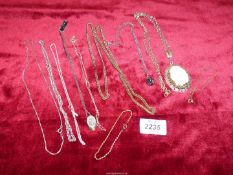 A quantity of costume jewellery including necklaces, chains etc.