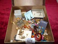 A quantity of costume jewellery including earrings,