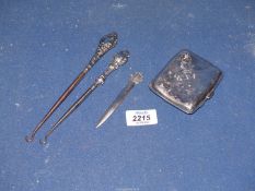 A small quantity of silver including Birmingham 1919 card case, two silver handled button hooks,