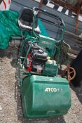 An Atco Royale 20E cylinder by Stratton engine mower, having key start with seat and roller,