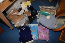 A suitcase and a box of gents jumpers, trousers, ties, etc.