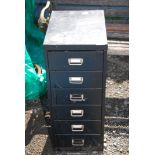 A six drawer filing cabinet.