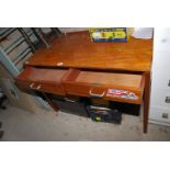 A two drawer table - 40" long x 20" Diameter x 28" high.