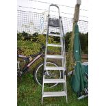 A seven rung Aluminium step Ladder.