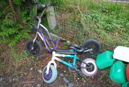 A Child's Bike and Scooter.