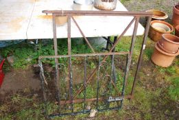 A piece of heavy duty railing 28 1/2" x 35, and a small garden gate 28" x 23".