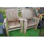 Six Teak garden chairs.