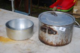 Aga saucepan with lid and two aluminium cake tins.