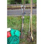 A fork, hand cultivator and a lawn edging spade.