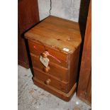 Three drawer pine bedside cupboard table.