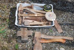 A variety of Carpentry tools, including small axe, hammers, and roll-up tape measure etc.