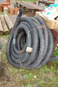 A roll of 3" land drain pipe.