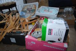 A box of mixed china, wooden coat hangers, storage jars and two x wall clocks.