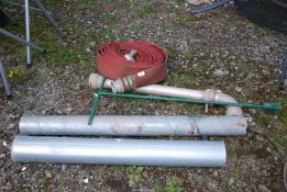 Two lengths of galvanised tubing, long-arm stop valve water hydrant tool, roll Layflat hose etc.