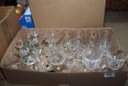 A box of mixed drinking glasses - including sherry and wine glasses.
