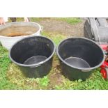 Two large plastic planters, 25" diameter x 18" deep.