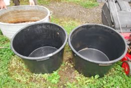 Two large plastic planters, 25" diameter x 18" deep.