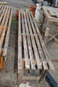 A long wooden slatted bench - 102" long x 17" depth x 19" high.