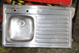 A stainless steel single drainer sink.
