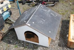 A small dog kennel.