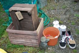 A concrete spaniel, three storage containers; two vegetable boxes, and a pair of Vans - sizes 8 - 9.