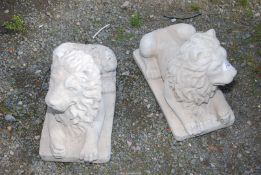 Two concrete lions. 13" high.