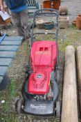 A Mountfield Lawn mower with grass box in working order.