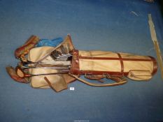 A quantity of vintage Golf clubs in leather zip case including wooden shafts and irons, Ben Hogan,