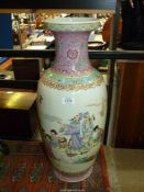 An Oriental vase with scenes of a garden party,