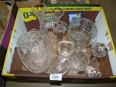 A crystal fruit bowl, rose bowl, candlesticks, preserve pot and three cut glass vases.