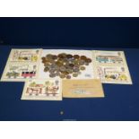 A quantity of foreign and English coins and stamps including George V and VI, Belgian stamps,