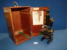 A microscope in wooden case supplied by W.R. Prior & Co. Ltd., February 1949, made by F.E.