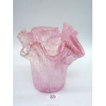 A heavy modern thick ruffled rim vase in pink and cream tones within clear glass, 9 1/2'' tall.