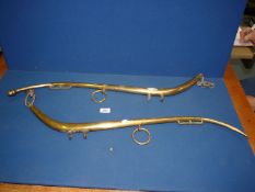 A pair of Victorian brass horse hanes marked, "Patent, solid brass - No.