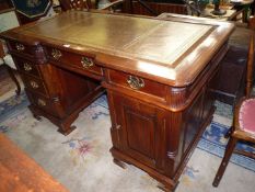 A Mahogany Kneehole Desk of good quality,