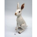 A well portrayed Studio Pottery hare by the potter John Hine, 13 1/2" tall,