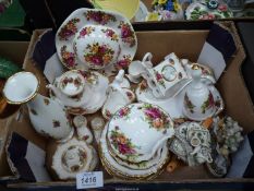 A quantity of Royal Albert 'Old Country Roses' ornaments to include basket, shoes, trinket dishes,