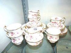 A Paragon 'Victoriana Rose' china tea set including six tea plates,