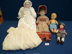 Four dolls including Rosebud, two having porcelain heads, etc.