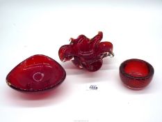 A circa 1950 Murano four leaf clover Sommerso bowl with stem handle all in ruby red with thick